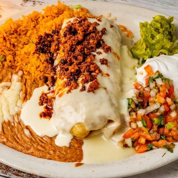 Cheesy burrito topped with chorizo, served with rice, refried beans, guacamole, sour cream, and pico de gallo.